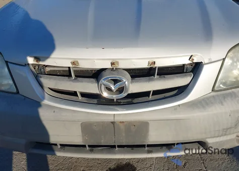 2002 Mazda Tribute Dx z USA, uszkodzony, nr VIN 4F2YU06B42KM34378